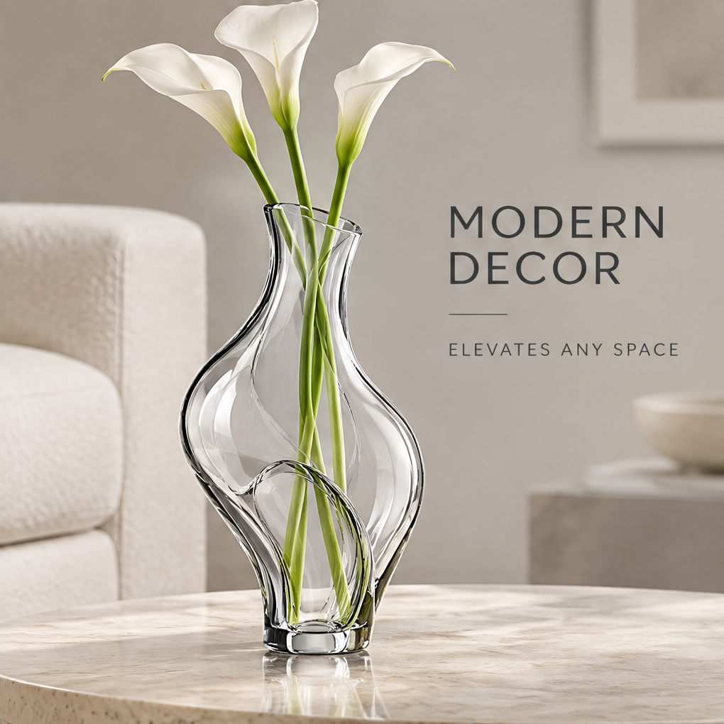 Clear crystal glass wave vase with white calla lilies on a marble round coffee table in a modern living room