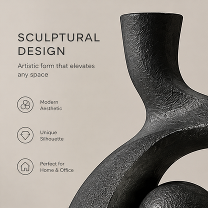 Unique sculptural form full view of the matte black wave vase showing perfect balance of art and function bringing modern elegance
