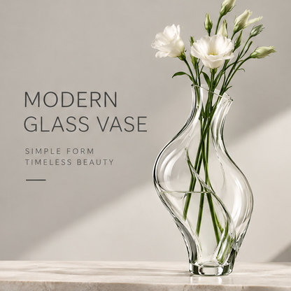 Modern glass vase with white lisianthus flowers on a marble shelf in warm natural light showing simple form and timeless beauty