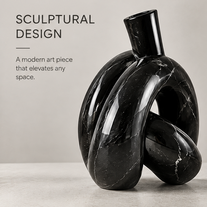 Full product view of black marble sculptural design knot vase showing striking blend of art and function
