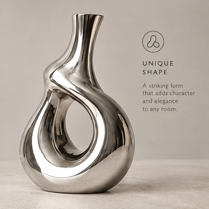 Unique shape mirror silver sculptural hollow vase showing striking form that adds character and elegance to any room